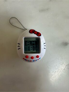 White Hello Kitty Tamagotchi Nano digital pet*Batteries NOT included